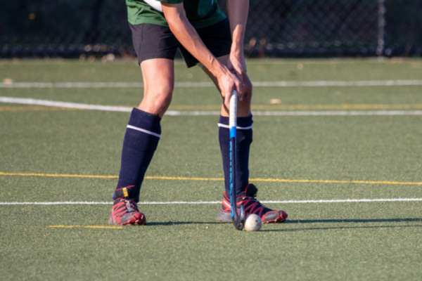 Person hitting a hockey ball