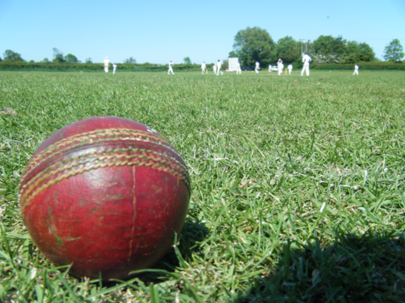 Close up of cricket ball on cricket pitch