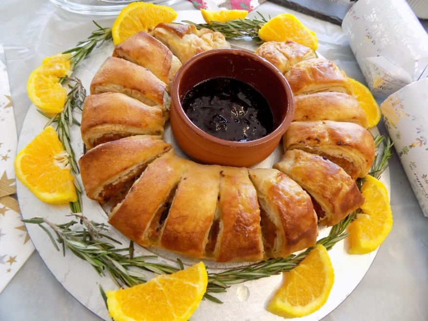 Pastry garnished with lemon and rosemary