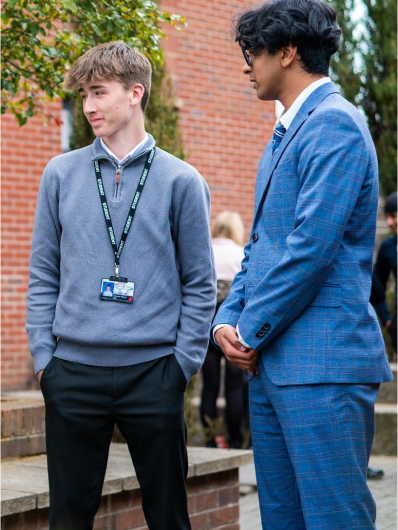 students talking outside  of school